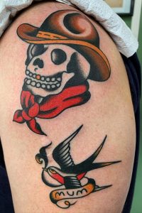 Tatuaje tradicional de calavera de vaquero