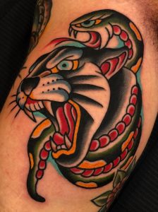 Tatuaje tradicional de pantera y serpiente