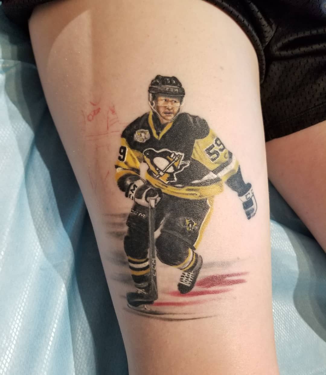 Tatuaje de hockey sobre hielo