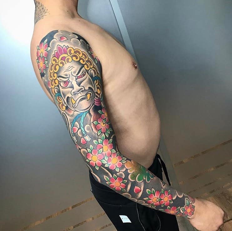 Tatuaje de Fudo Myoo en el brazo