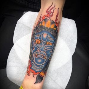 Tatuaje de Fudo Myoo en el antebrazo