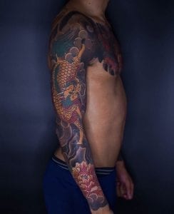 Tatuaje de Kirin en el brazo