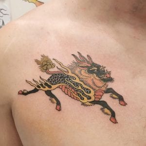 Tatuaje de Kirin en el pecho
