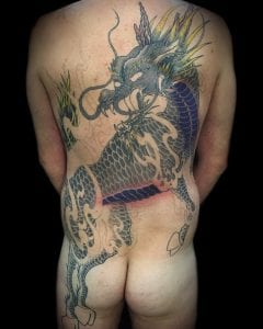 Tatuaje de Kirin en la espalda
