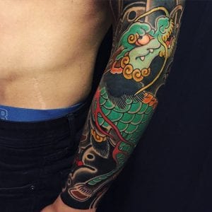 Tatuaje de Kirin en el antebrazo