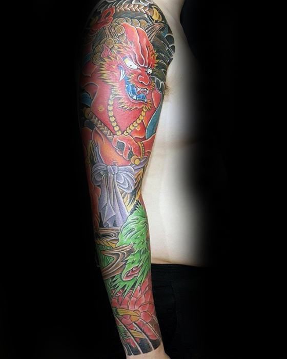Tatuaje de raijin en el brazo