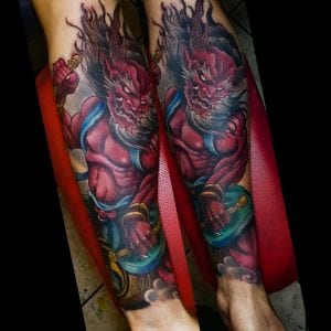 Tatuaje de raijin en el antebrazo