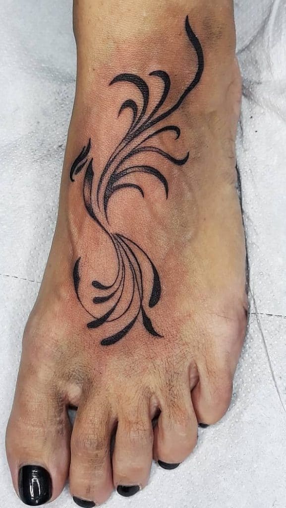 Tatuaje De Fénix Tribal