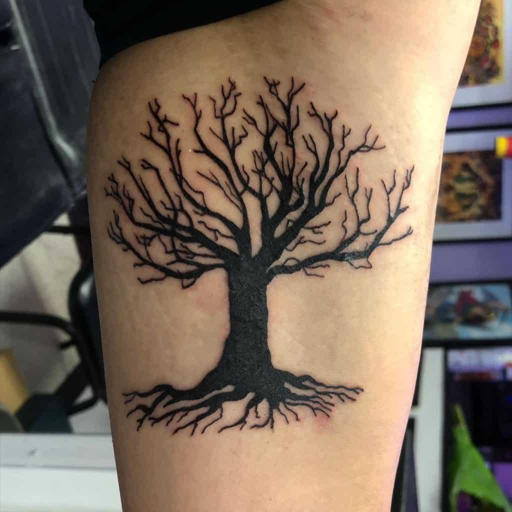tatuaje del árbol de la vida sobre la cicatriz