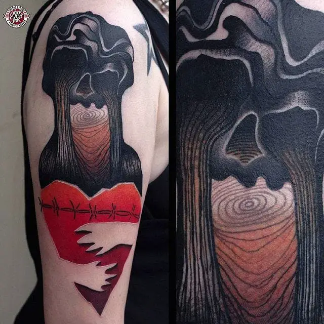Tatuaje semi-abstracto negro y rojo de Łukasz Sokołowski.  #LukaszSokolowski #semiabstract #blackred #abstract #graphic #conceptual #heart