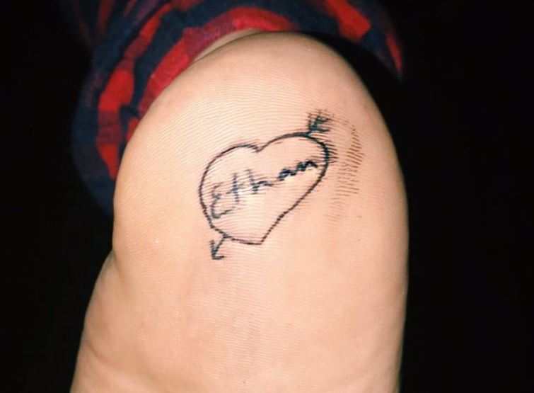 Tatuaje del corazón de Grayson