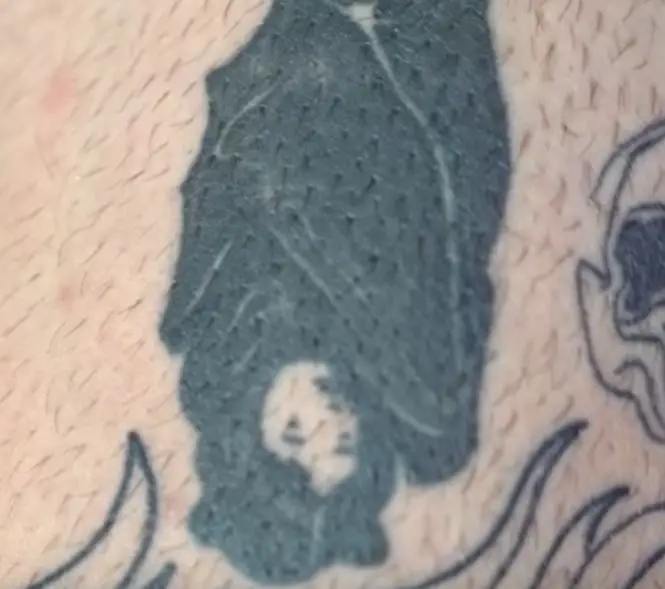 Tatuaje de batgirl de Grayson