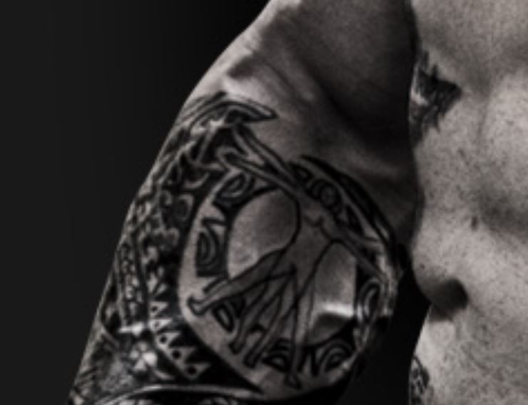 Martyn tattoo en el antebrazo