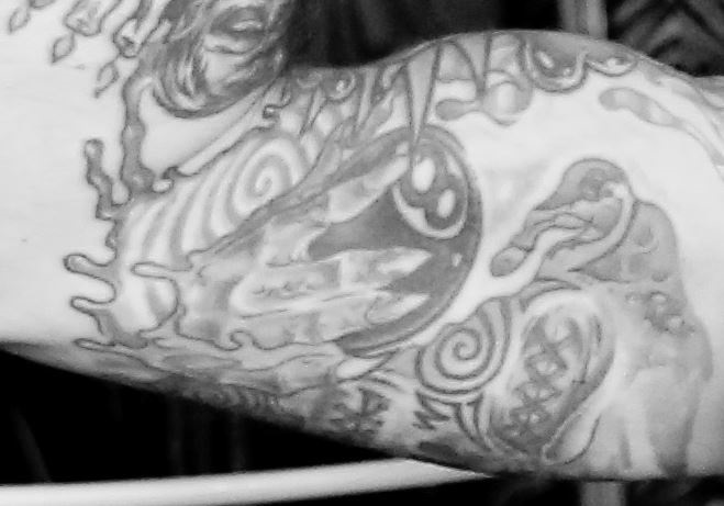 Tatuaje de rob inner bíceps