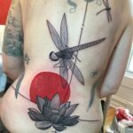 Intensos tatuajes negros y rojos de Yann Black