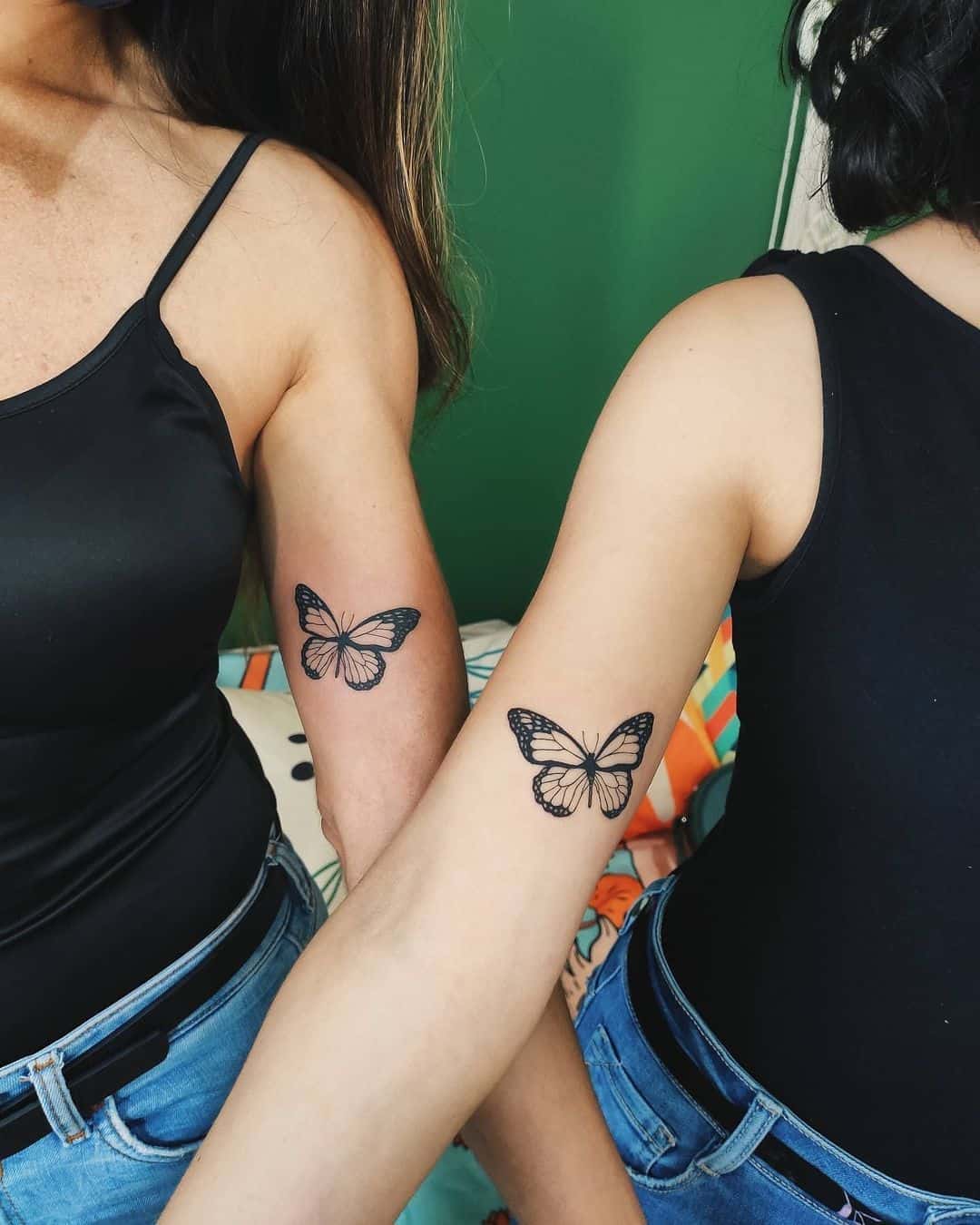 Madre de dos tatuajes