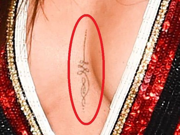 Cheryl Cole - Tatuajes de fisión
