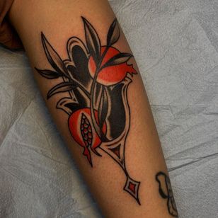 Tattoo by Sema Dayoub #semadayoub #nassimdayoub #traditional tattoo #qttr #queertattooer #darkkintattoo #darkkinbodyart #hamsa # pomegranate #floral #plant #fruit #ornamental
