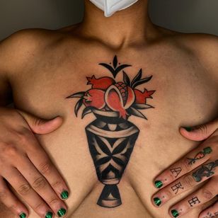 Tattoo by Sema Dayoub #semadayoub #nassimdayoub #traditionaltattoo #qttr #queertattooer #darkkintattoo #darkkinbodyart #vase #pomegranate #flowers #pattery #breast