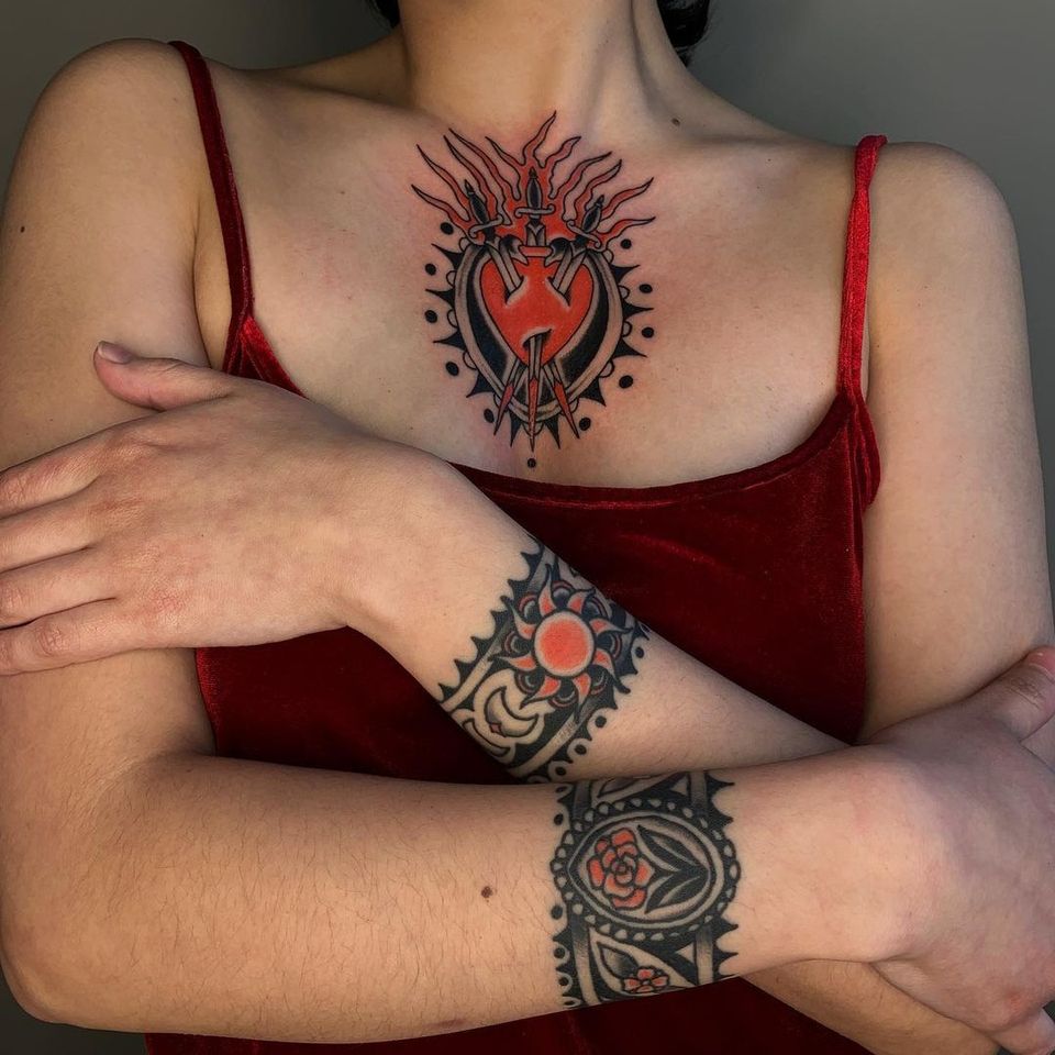 Tattoos by Sema Dayoub #semadayoub #nassimdayoub #traditionaltattoo #qttr #queertattoos #cuffs #bracelets #flower #sun #heart #saintheart #threeofsword #breast #wrist