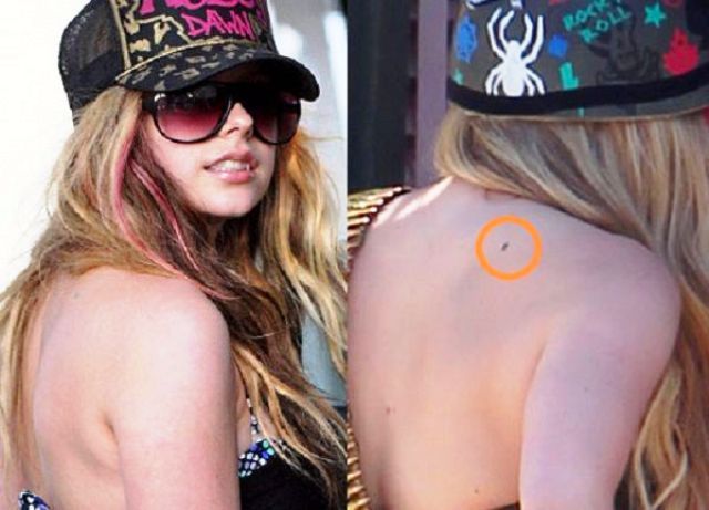 Tatuaje de estrella de Avril Lavigne en la parte superior de la espalda