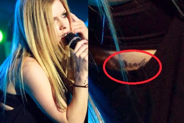 Tatuaje de Avril Lavigne de costillas derechas