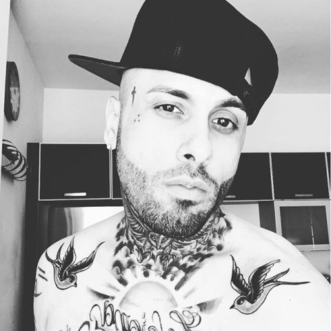 tatuaje de dios sol y pájaros voladores-nicky jam