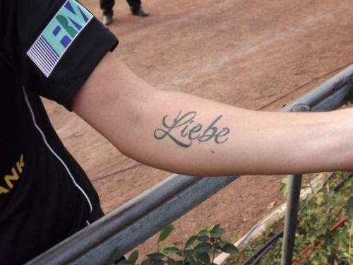 Tatuaje en el brazo de Ali Krieger