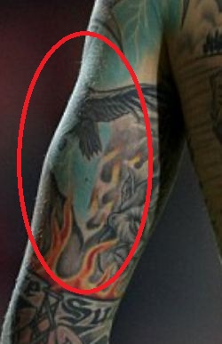 Daniel Agger Flying Bird and Flames Tattoo
