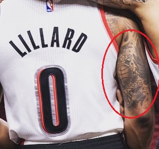 Damian Lillard Tattoo en la parte posterior del brazo derecho