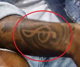 Tatuaje del símbolo de Meek Mill
