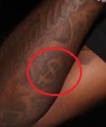 Tatuaje de signo de dólar Meek Mill