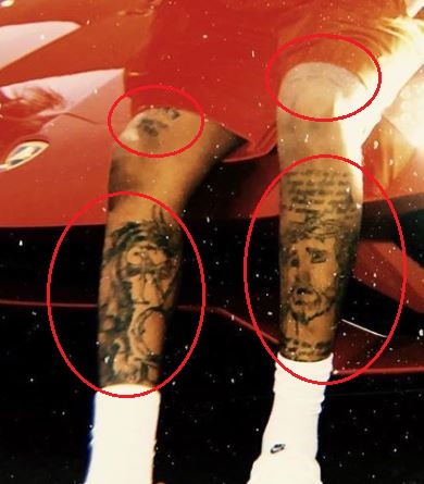 Tatuaje de YG en la pierna