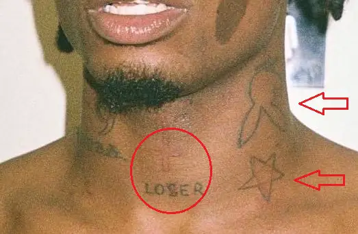 Playboi Carti cruz estrella conejito palabra tatuaje