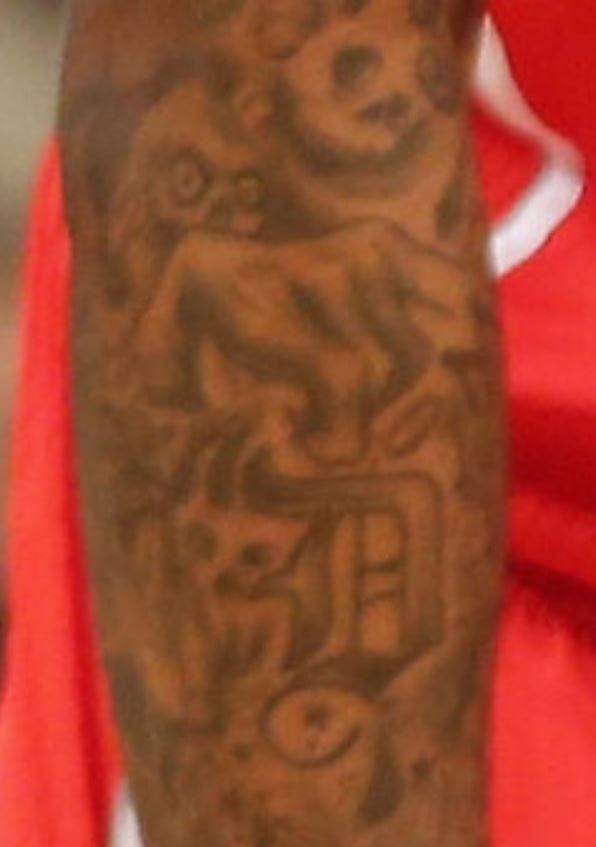 Tatuaje de DeShawn en el antebrazo