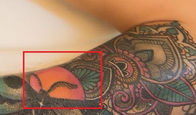 tatuaje de sarah jessie en el brazo izquierdo