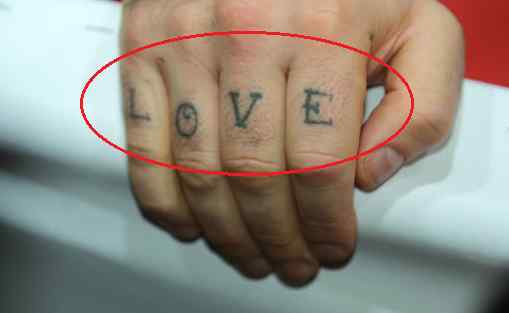Robbie Williams ama los tatuajes