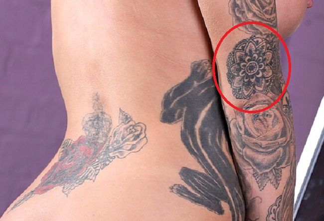 Tatuaje en el brazo tatuaje de juez mandala Alice